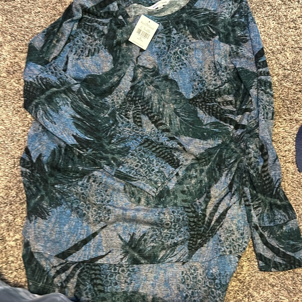 green, blue, and purple long sleeve